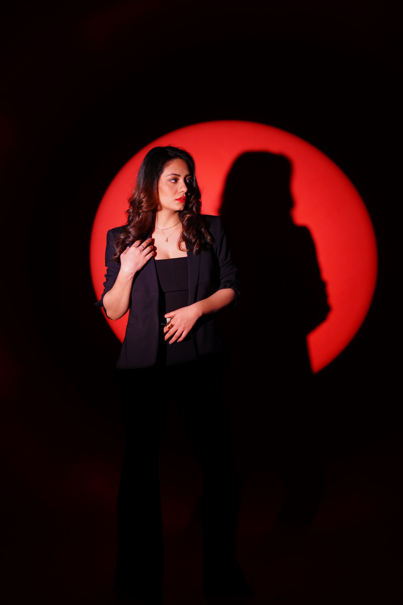 Chhavi Pradhan portrait with red backdrop