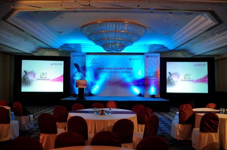 Bada Sahab corporate AV setup with stage and projection